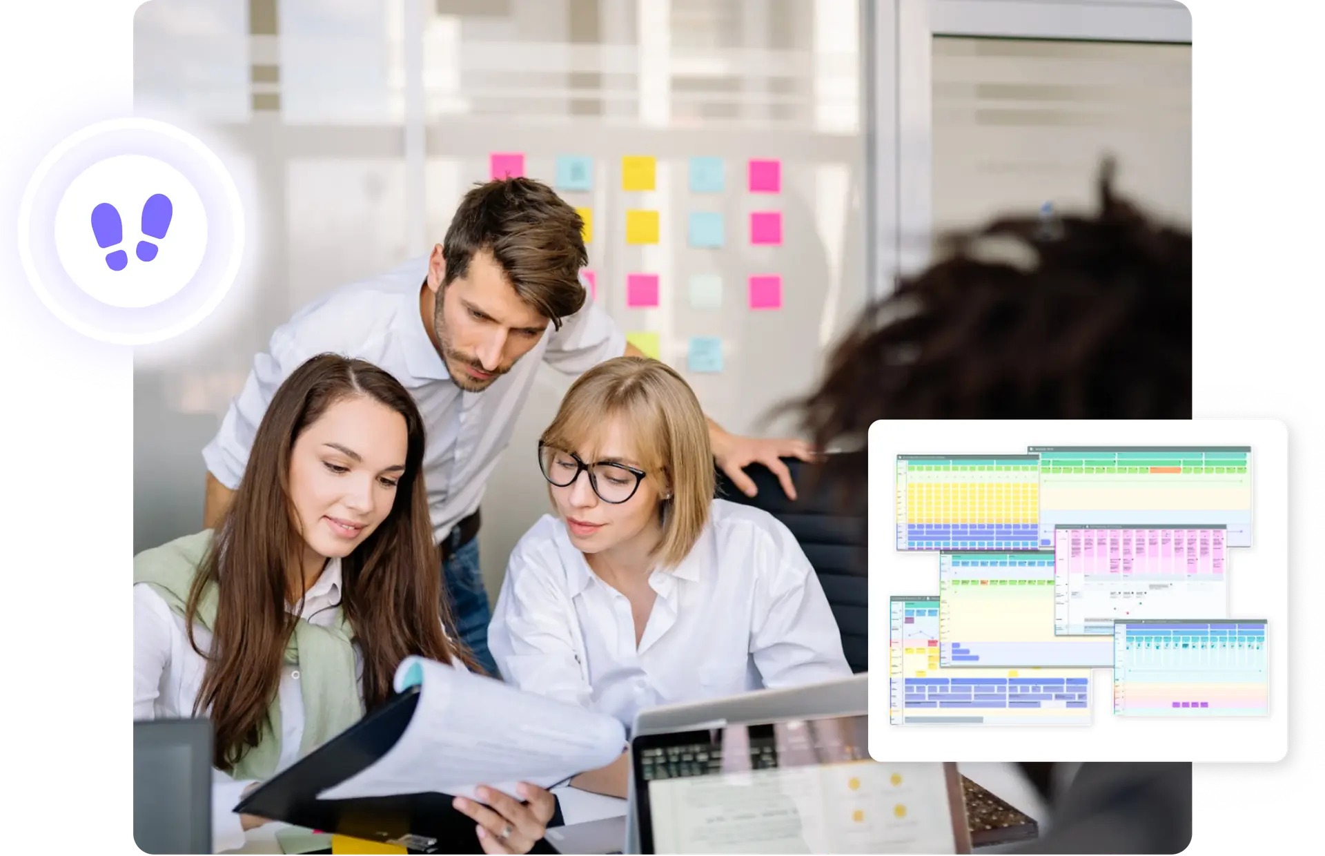 A team sitting together at a table looking at a laptop screen and printed guidelines.